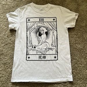 Spencer’s white t-shirt